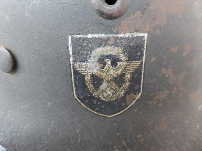 Lot 217 - A German Third Reich M35 Police Double Decal Helmet, with dark green finish, police and party...