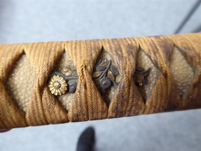 Lot 224 - A Japanese Shinto Katana, the 69cm steel blade with faint undulating hamon, one piece copper habaki