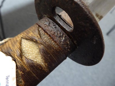 Lot 224 - A Japanese Shinto Katana, the 69cm steel blade with faint undulating hamon, one piece copper habaki