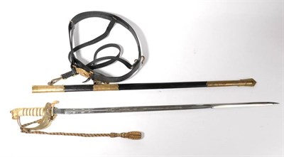 Lot 264 - An Elizabeth II Naval Officer's Sword, the 79cm fullered steel blade etched with the Royal...