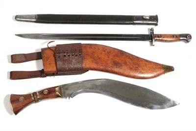 Lot 278 - A Copy of a First World War Ghurka Kukri, the curved steel blade stamped Co I, broad arrow, G,...