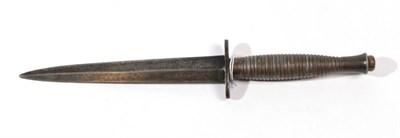 Lot 282 - A ''Fairbairn Sykes'' Fighting Knife, third pattern, with 17cm unmarked machine forged diamond...