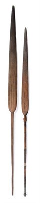 Lot 292 - Two Early 20th Century Congo Wood Paddle Clubs, each with long leaf shape head with grooved chevron