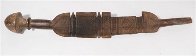 Lot 299 - A 19th Century Papua New Guinea Wood Sword Club, the irregular oblong shape blade carved with...