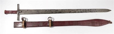 Lot 307 - A 19th Century Sudanese Kaskara, the 88cm triple fullered double edge steel blade stamped with...