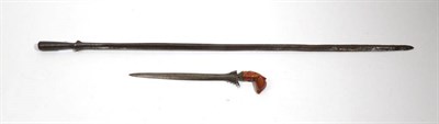 Lot 311 - A Javanese Kris, with 28cm straight double edge pamor steel blade and wood garuda bird hilt,...