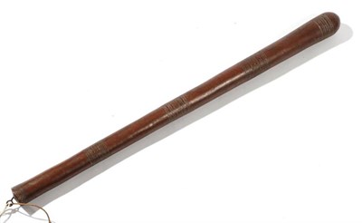 Lot 313 - A 19th Century Fijian Bowai Club,  of dense honey coloured wood, with domed tip, the...