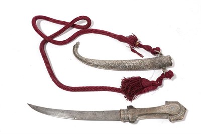 Lot 315 - An Early 19th Century Moroccan Jambiya, the 23cm curved steel blade double edge for the last...