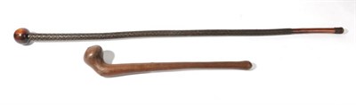 Lot 321 - A Zulu Chief's Staff, of lignum vitae, with small globular head and tapering cylindrical haft,...