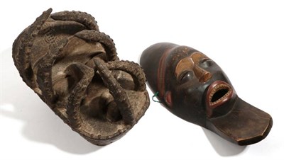 Lot 332 - A Bete, Ivory Coast Large Wood Mask, with exaggerated forehead, large domed slit eyes, block carved