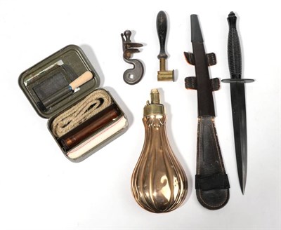 Lot 349 - A 19th Century Copper Powder Flask, with fluted decoration, brass charger and external spring;...