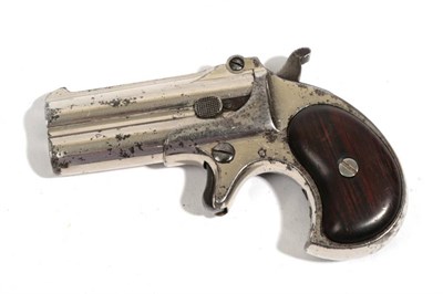 Lot 393 - A Remington .41 Rimfire Over and Under Double Barrel Deringer, with nickel plated finish, the...