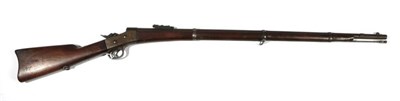 Lot 423 - A Remington Rolling Block Rifle, the 89cm round barrel with hinged ladder rear sight, the tang...