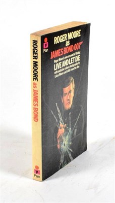 Lot 43 - Moore, Roger Roger Moore as James Bond 007. Pan, 1973. 8vo, org. wrappers; four pages of colour...