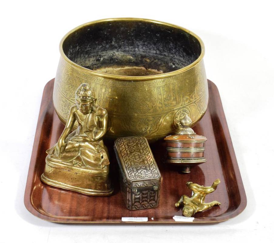 Lot 5 - A Persian brass bowl, bronze Buddha, silver inlaid box, figure of a boy and a Tibetan prayer wheel