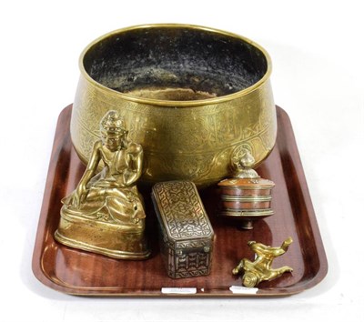 Lot 5 - A Persian brass bowl, bronze Buddha, silver inlaid box, figure of a boy and a Tibetan prayer wheel