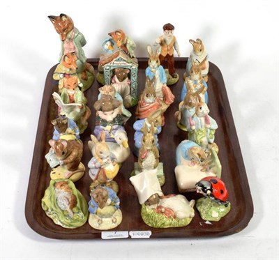 Lot 7 - A group of twenty-five Royal Albert Beatrix Potter figures including  Mother Ladybird; Hunca...