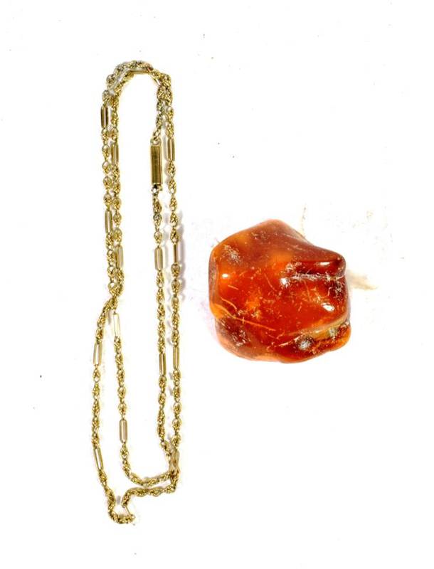 Lot 53 - A fancy link necklace, with an applied plaque stamped '9C', length 49cm; and an amber piece