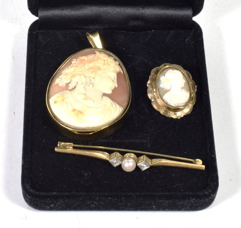 Lot 59 - A cameo pendant, bale stamped '585', measures 4cm by 6cm; a cameo brooch, unmarked; a pearl and...