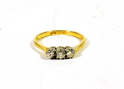 Lot 65 - A diamond three stone ring, stamped '18CT' 'PLAT', finger size M