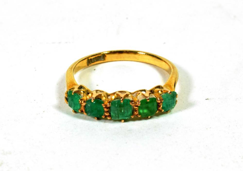 Lot 66 - An emerald five stone ring, marks unclear