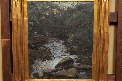 Lot 890 - Robert Oswald Moser RI, ROI (1874-1953) Sunlit Wooded Stream Signed and dated 1922, oil on...