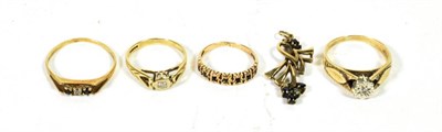 Lot 73 - Two 9 carat gold diamond solitaire rings, finger sizes I and N1/2; a 9 carat gold three stone ring
