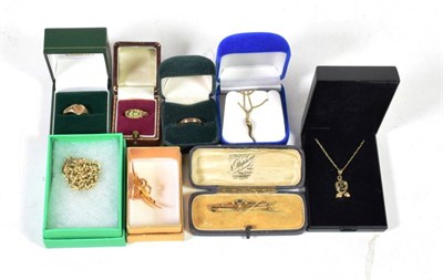 Lot 79 - A small group of gold jewellery including a 9 carat gold band ring, finger size J1/2; a 9 carat...