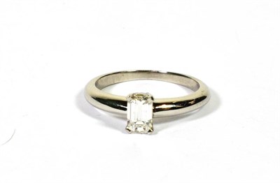 Lot 100 - A platinum solitaire diamond ring, an octagonal cut diamond in a claw setting, estimated...