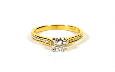 Lot 104 - An 18 carat gold solitaire diamond ring, a round brilliant cut diamond in a claw setting, to...