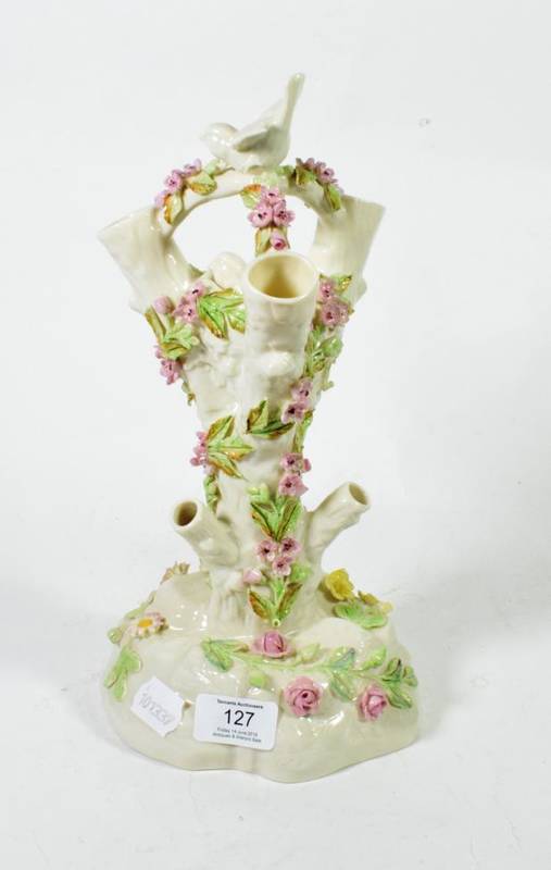 Lot 127 - A Belleek centrepiece ''Bird Stump'' vase