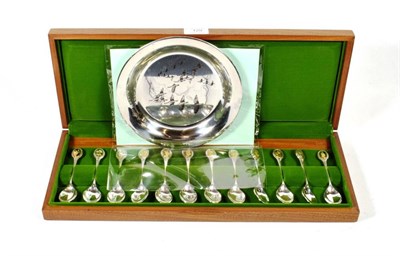 Lot 129 - The Royal Horticultural Society Flower spoons: a set of twelve parcel gilt silver spoons in...