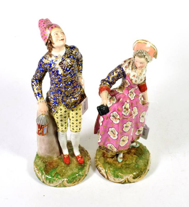 Lot 133 - A pair of Samson Derby figures, 19th century, modelled as man holding a lantern and a bonneted lady