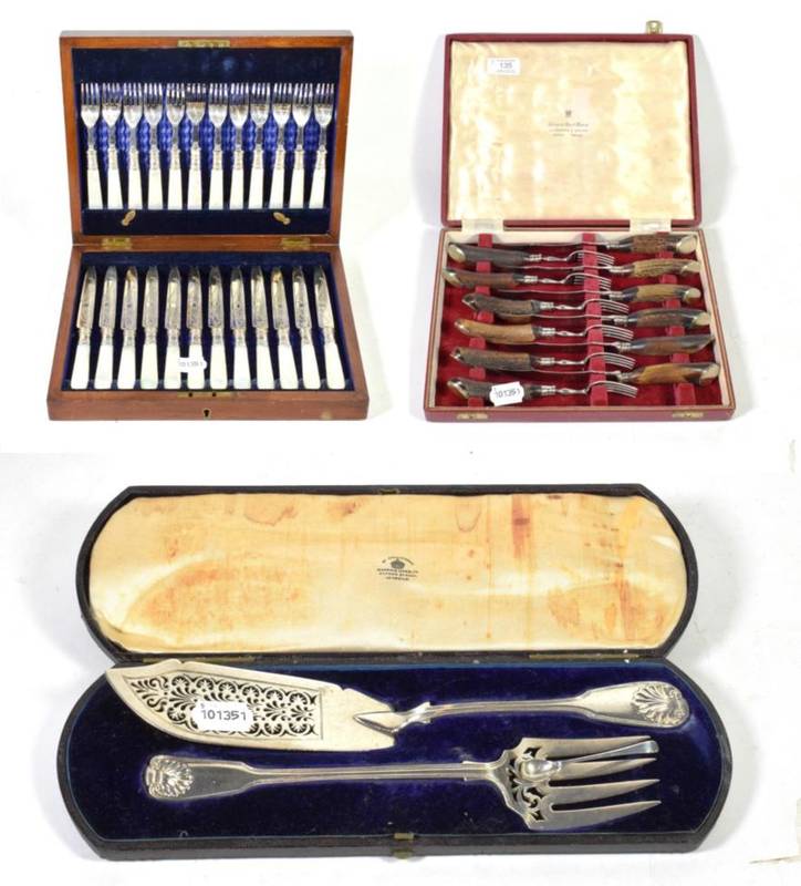 Lot 135 - Silver fish slice and fork; mother-of-pearl dessert cutlery; and a case of antler horn cutlery