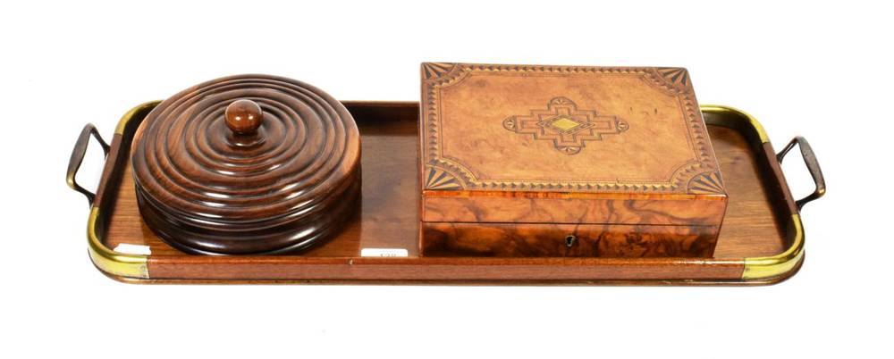 Lot 138 - A 19th century brass mounted twin handled tray; turned lignum vitae powder box and cover; and a...