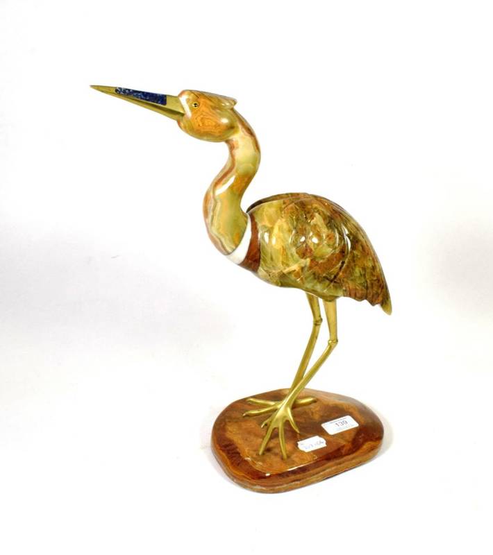 Lot 139 - A onyx carving of a heron with gilt metal legs and beak, the beak inset with lapiz lasuli