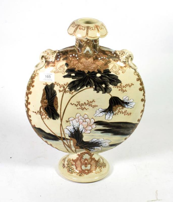 Lot 165 - A Japanese Satsuma twin handled vase of flask form, circa 1900