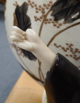 Lot 166 - A Japanese Meiji period bronze and ivory figure of a geisha (a.f.)