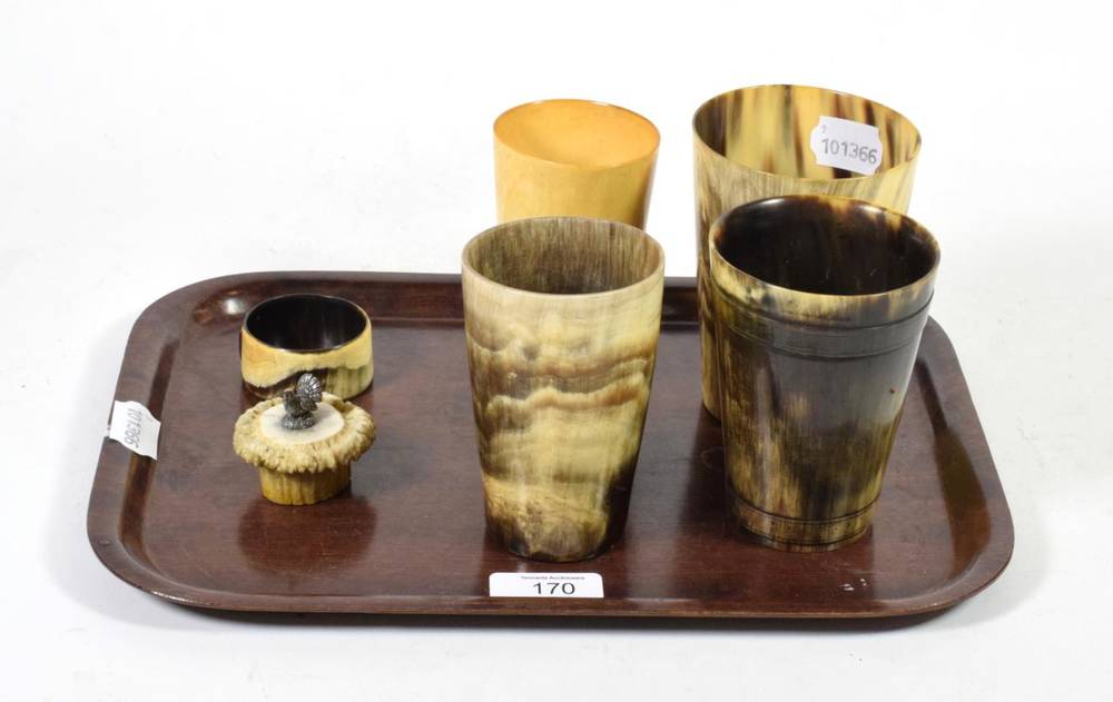 Lot 170 - Four horn beakers; a horn napkin ring; and a white metal capercaillie mounted on an antler