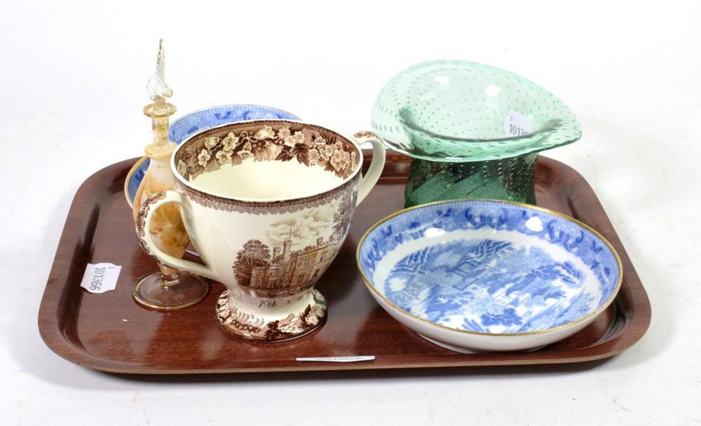 Lot 171 - A Victorian Wedgwood twin-handled cup printed with Bolesworth Castle; two blue and white saucers; a