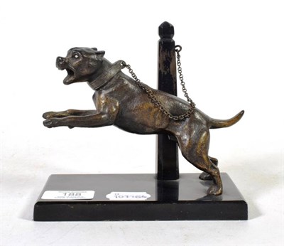 Lot 188 - A bronze model of a hound chained to a post