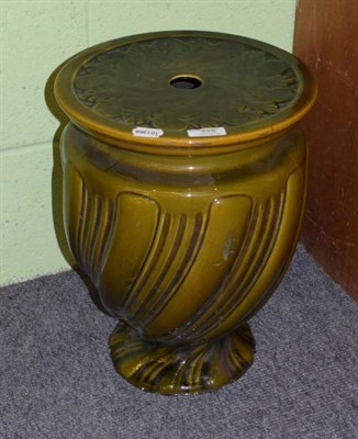 Lot 228 - A green glaze garden seat