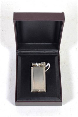 Lot 234 - A Dunhill lighter, numbered to the underside 490826, in a later Dunhill case