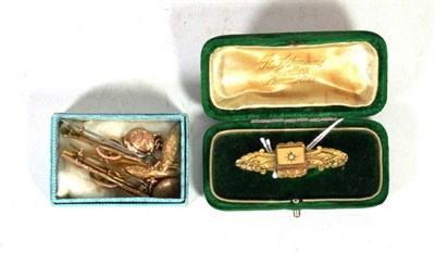 Lot 262 - A 9 carat gold Victorian bar brooch, length 4.2cm; three bar brooches stamped '9CT'; and a pair...