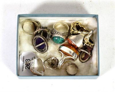 Lot 263 - Twelve silver/unmarked dress rings, various sizes