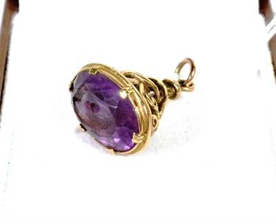 Lot 266 - A 9 carat gold ornate amethyst fob