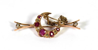 Lot 267 - A ruby, diamond and pearl crescent brooch, the graduated oval rubies alternate with old cut...