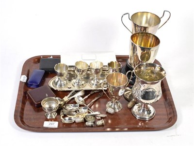 Lot 297 - An early 20th century goblet, London 1917; with assorted presentation cups, thimbles, spoons,...