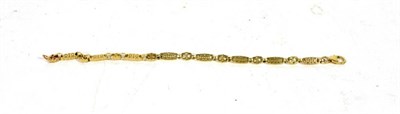 Lot 303 - A fancy link bracelet, clasp stamped '375', length 18.8cm