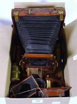 Lot 346 - A wooden plate camera, circa 1900, with lens, plates etc